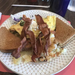 The Athenian Omelette comes with home fries, and toast.  I added bacon.
