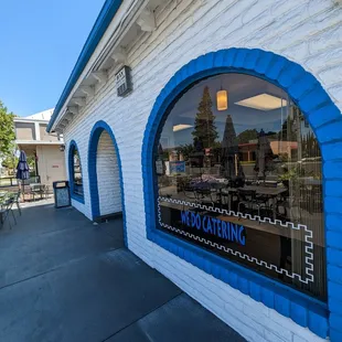 the reflection of a building in a window