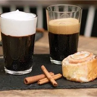 a cup of coffee and a pastry