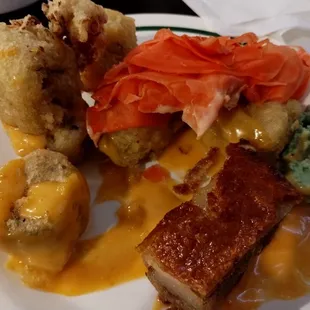 Some type of fried pork on this plate is amazing