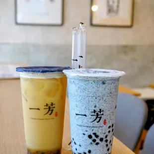 Sesame Milk Smoothie ($6.80). Yakult Passionfruit Green Tea ($5.75).