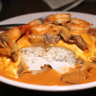 Inside of Tom Yum Omelet Rice ($19) - organic free-range eggs with milk, tom yum shrimp, oyster mushroom, kaffir lime leaves.