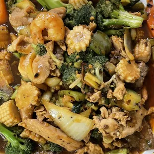 a chicken and broccoli dish in a styrofoam container