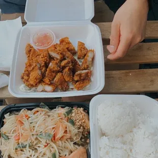 We bought their papaya salad,  crispy pork bell, and white rice!