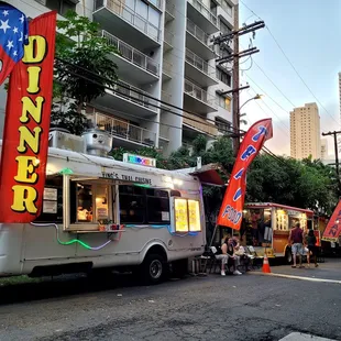 Food trucks in an alley 2 blocks from Kuhio Beach.