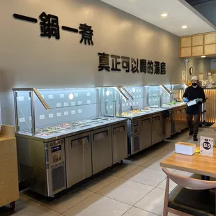 a man standing in a restaurant