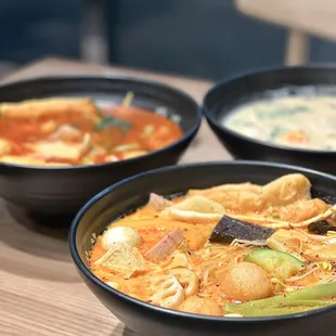 three bowls of soup