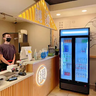 a man standing at the counter