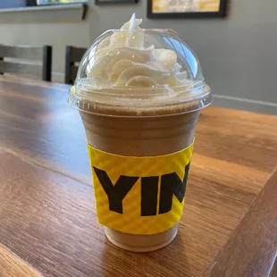 a cold drink with whipped cream