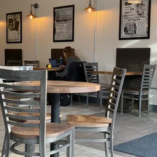 a woman sitting at a table