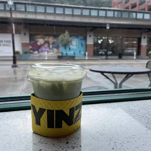Iced matcha latte with raspberry