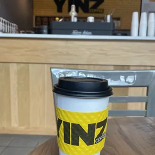a coffee cup on a table