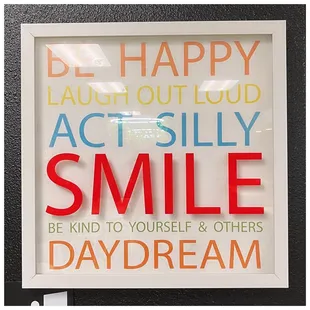 a sign that says be happy laugh out loud act silly smile be kind to yourself and others day