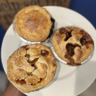 pie box featuring peach, mixed berry &amp; caramel apple