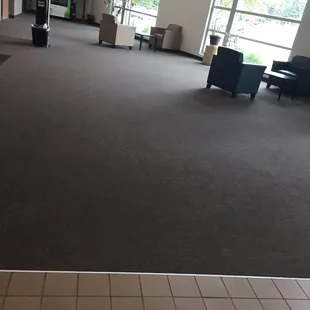 Bare lobby area of the Y, reflecting a commitment to non-congregating areas
