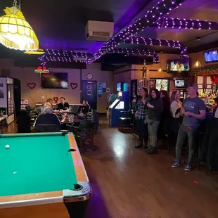 a pool table in a bar