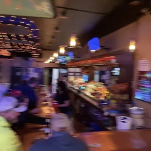 a blurry view of a bar