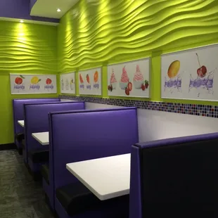 An interior view of Yo-B with some booths and a few table a with chairs, for those who don&apos;t like booths.