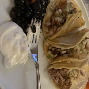 Corn tortilla tacos; chicken beef pork with black beans