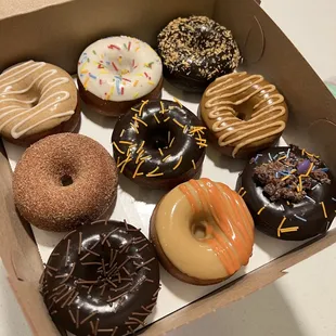 a variety of donuts in a box