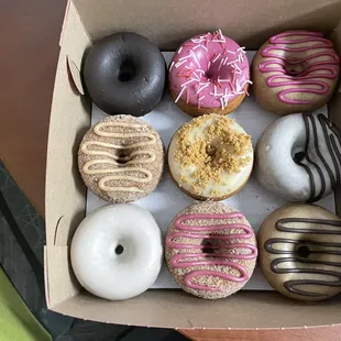 a variety of donuts in a box