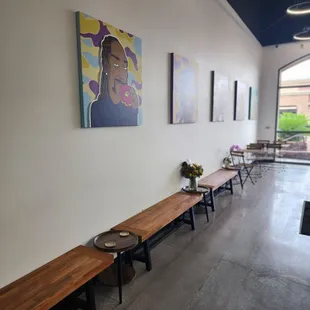 a row of benches in a cafe