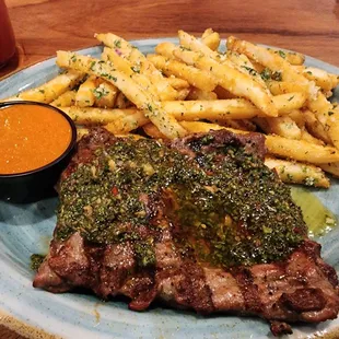 Chirrasco plate with garlic truffle fries. Steak is medium rare