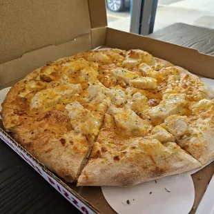 Chicken alfredo pizza! (No onions for us)