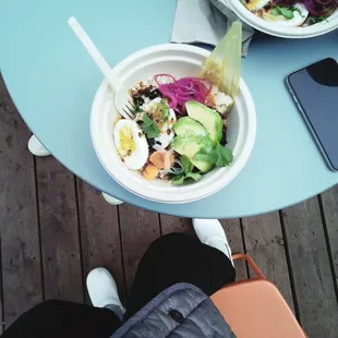 two bowls of food on a table