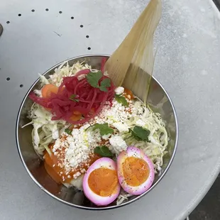 Dos tamales + pickled egg