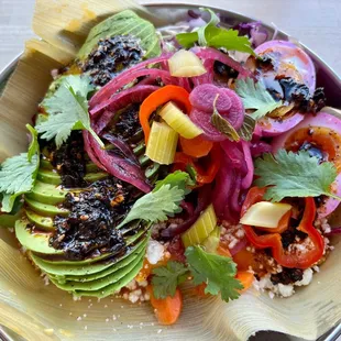 Hugo St Retreat: tamal with queso fresco, pickled egg, cabbage slaw, avocado, chili oil