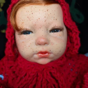 We repair dolls at a low cost but with lots of love. And we do freckles. Lots and lots of freckles.