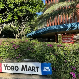 a sign in front of a building