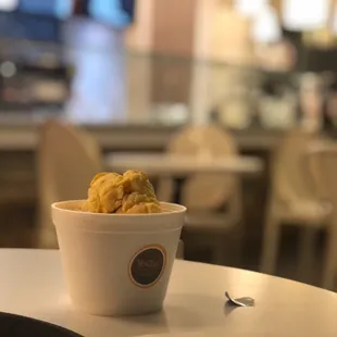 a cup of yogurt on a table