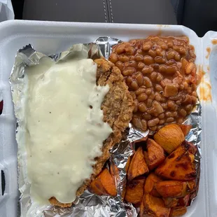 a meal in a styrofoam container