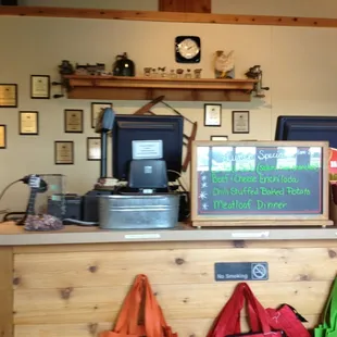 a counter with a sign on it