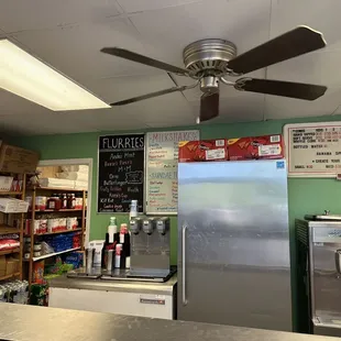 a woman standing in front of the counter