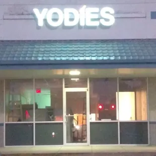 the front of the store at night