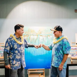 Art Instructors, Mark Brown (left) and Patrick Ching (right) in front of their work. See our website for art course schedule.