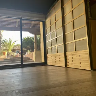 Our space is lined with windows allowing for lovely light in the space and a view of the courtyard.
