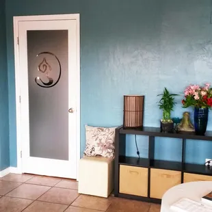 The entry room of Yoga Studio Satya. We like to provide a calm and relaxing experience for all of our guests.