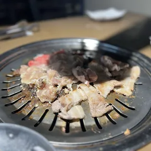 Chicken, pork belly and beef brisket