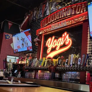 a neon sign for yogi's