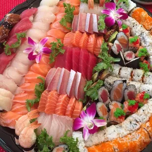 $100 dollar sushi/sashimi/roll platter