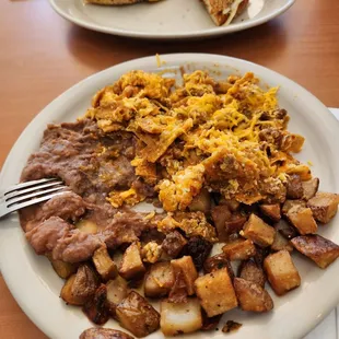 Chiliqueles, potatoes, and beans !