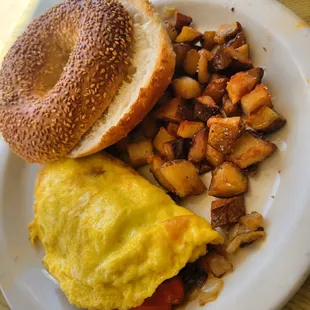 California Omelet, home fries, and sesame bagel