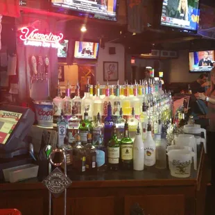 a woman behind the bar