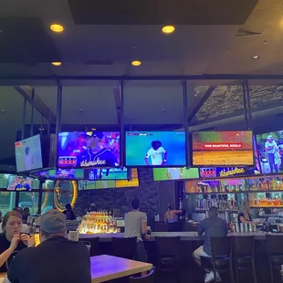 people sitting at the bar