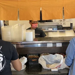 The person who said I was trespassing after I paid for my food and still had not received it.