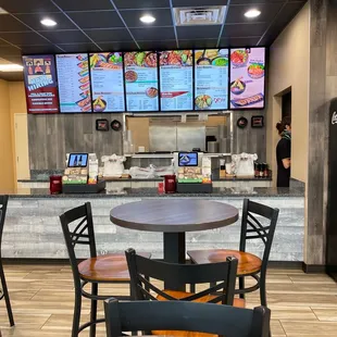 a table and chairs in a restaurant